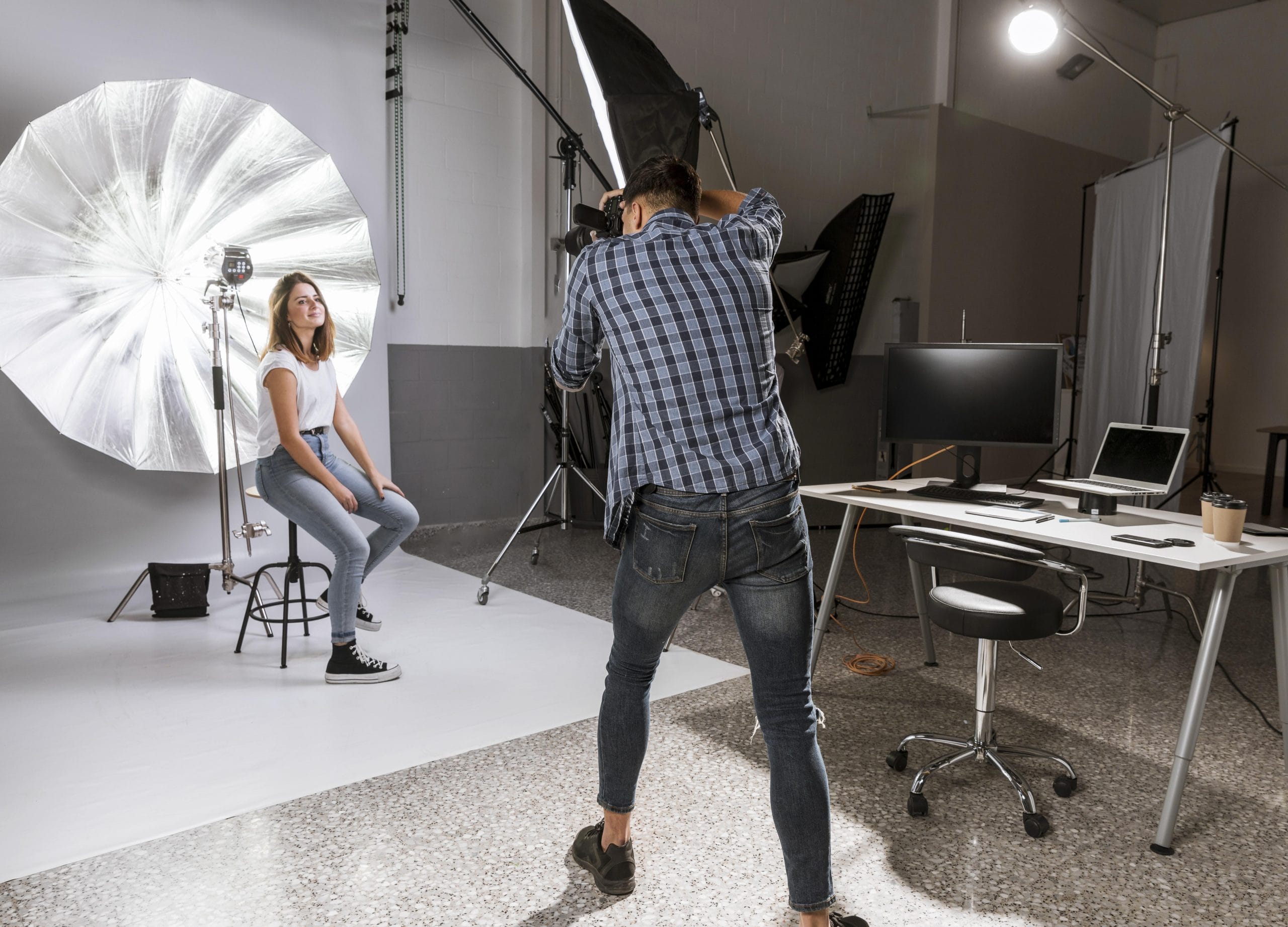 long-shot-man-taking-photos-beautiful-model